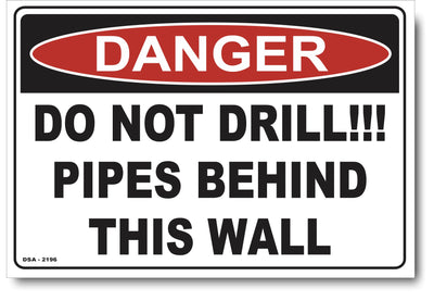 Danger Do Not Drill!! Pipes Behind This Wall Sign