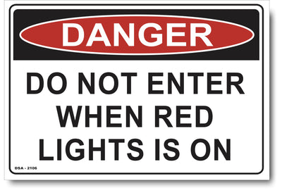 Danger Do Not Enter, When Red Light Is On Sign