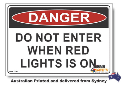 Danger Do Not Enter, When Red Light Is On Sign